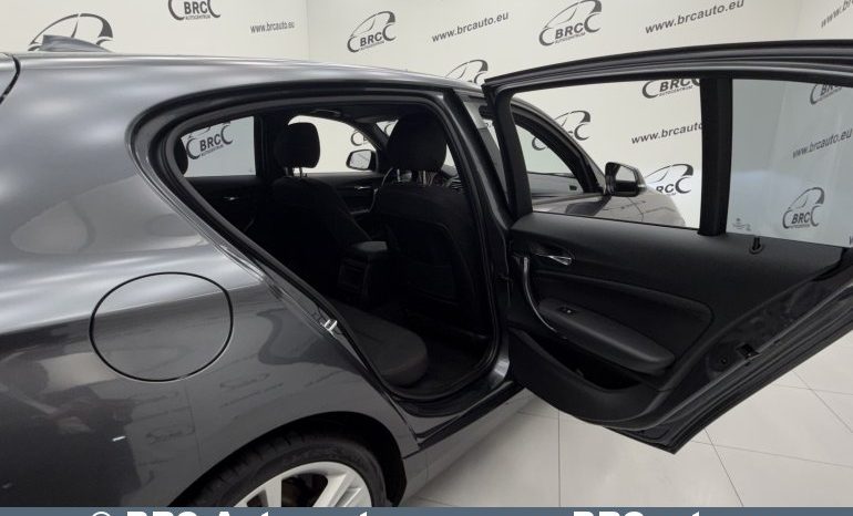 BMW 116 i Sport 2012 full